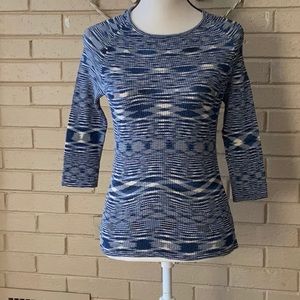 Unknown blue/cream color size M excellent condition. Look in neck for brand